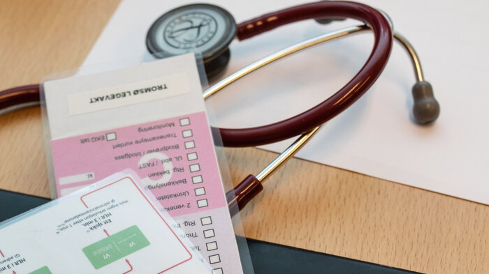 Bilde av skjemaer på legekontor