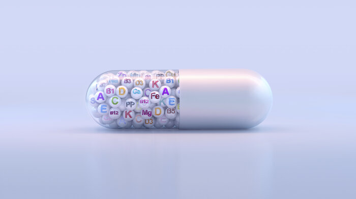 Bildet viser en stor kapsel som inneholder mange ulike stoffer.