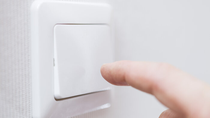 Bildet viser en lysbryter.