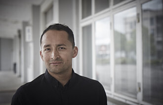 Bildet viser et portrett av Audun Ivan Kalstad Mo