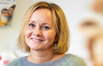 Bildet viser et portrett av Astrid D. Midtsund