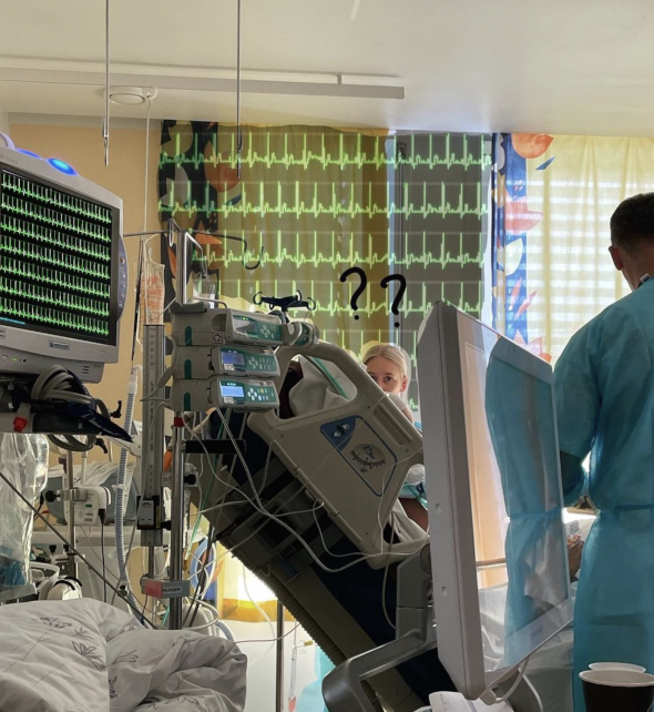 Bildet viser sykepleiere ved pasientseng.