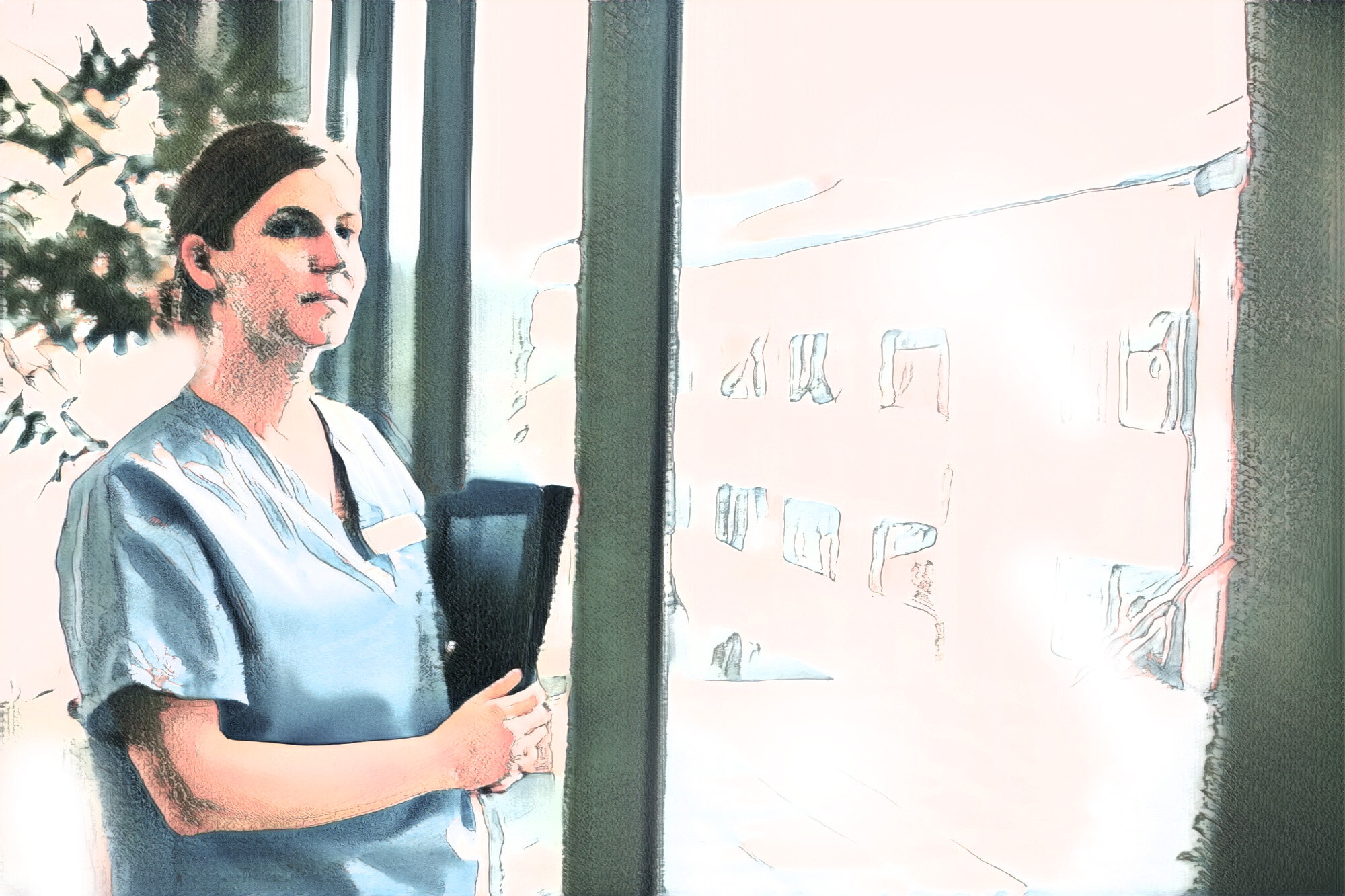 Bildet viser en ettertenksom sykepleier.