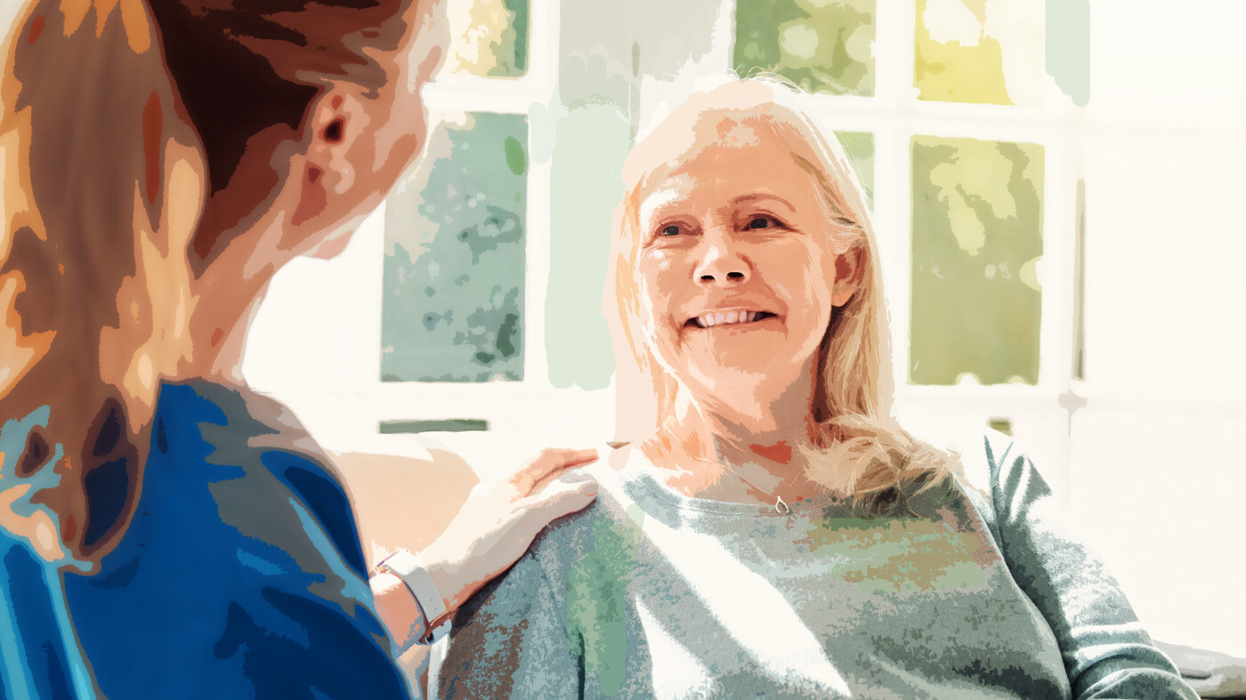 Bildet viser en helsesykepleier som anerkjenner en annen helsesykepleier